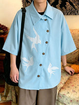 Men's Japanese Harajuku Flying Bird Print Asymmetric Diagonal Button Short Sleeve Shirt SKUL63005